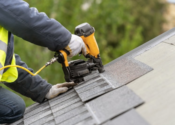 roofer installing roof